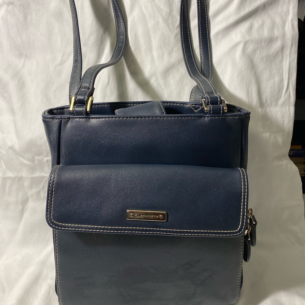 Liz Claiborne Navy blue hand bag. Gently used zip and snap closure